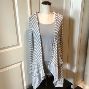 Gray and white maternity cover up.
